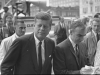 John F. Kennedy walking in group of men; Jim Wright to JFK’s left 11/22/1963